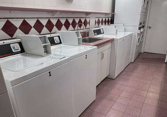 Laundry room with washers and dryers at 33 Furnace Avenue, Quincy