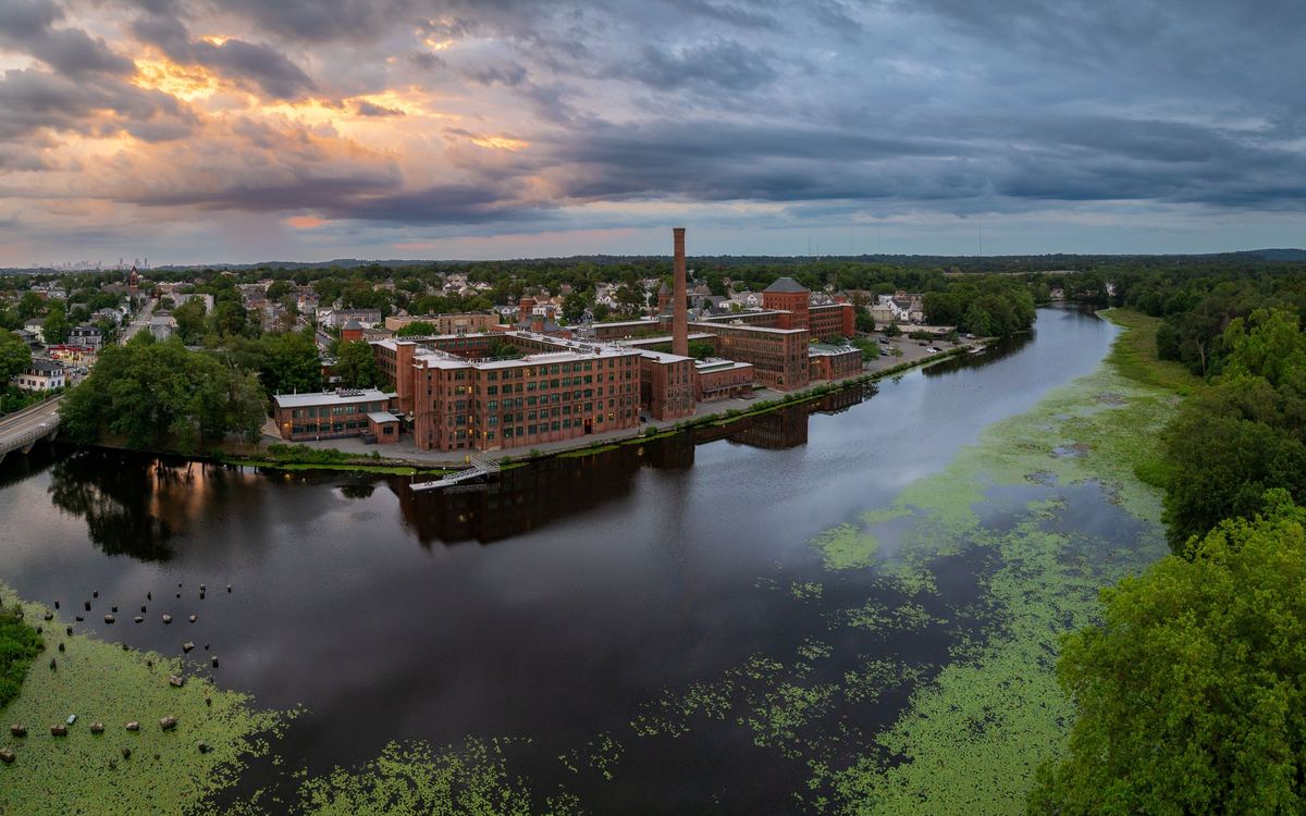 Historic mill buildings along the Charles River in Waltham, Massachusetts